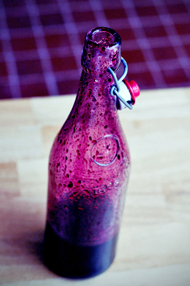 blueberry ginger syrup in a bottle